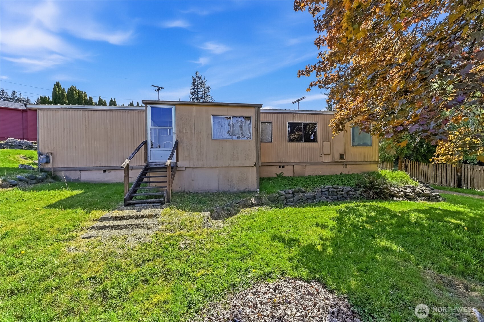 32711 Commission Avenue Black Diamond, WA 98010 - Photo 21 of 34 a view of backyard with a garden and plants