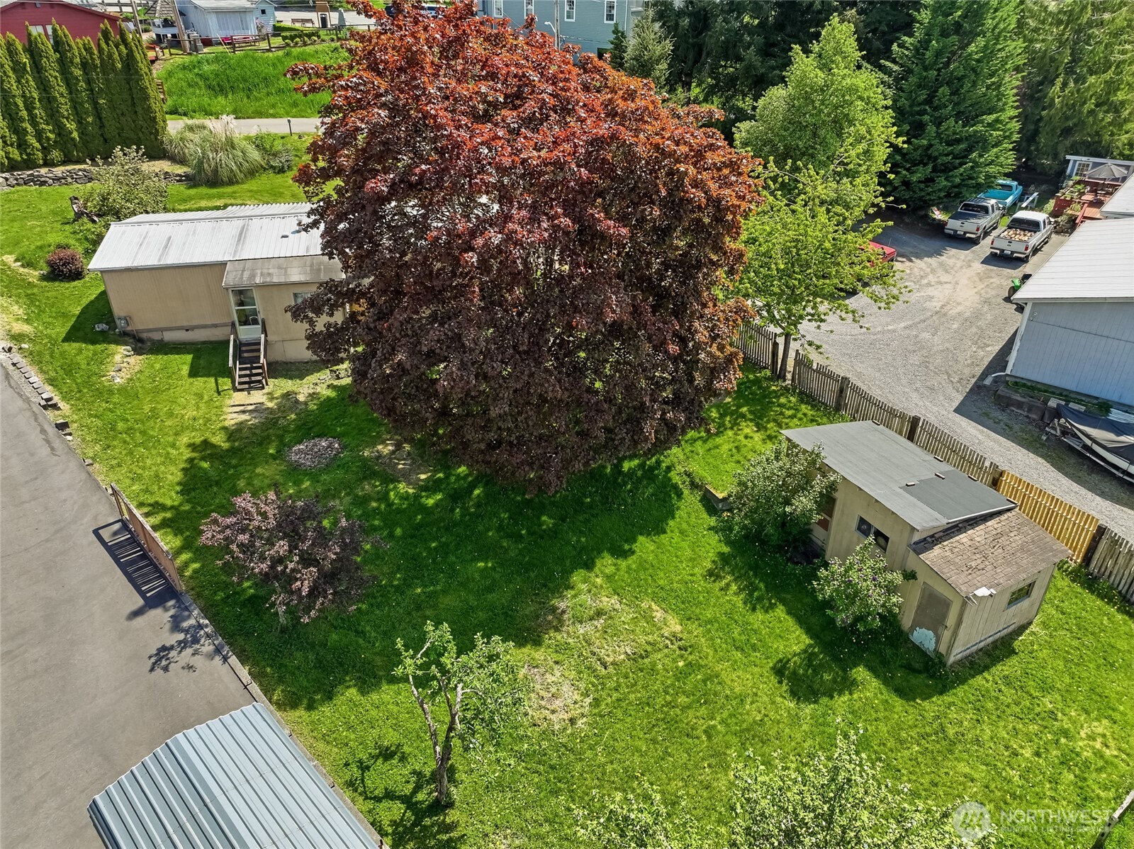 32711 Commission Avenue Black Diamond, WA 98010 - Photo 25 of 34 an aerial view of a house with garden space and street view