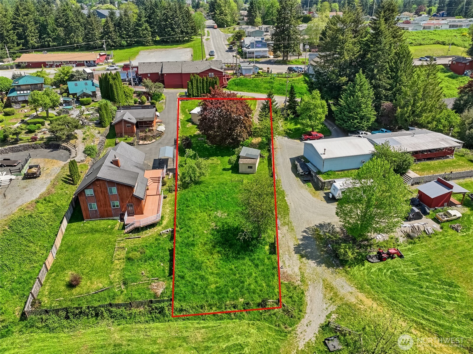 32711 Commission Avenue Black Diamond, WA 98010 - Photo 32 of 34 an aerial view of residential houses with outdoor space and street view