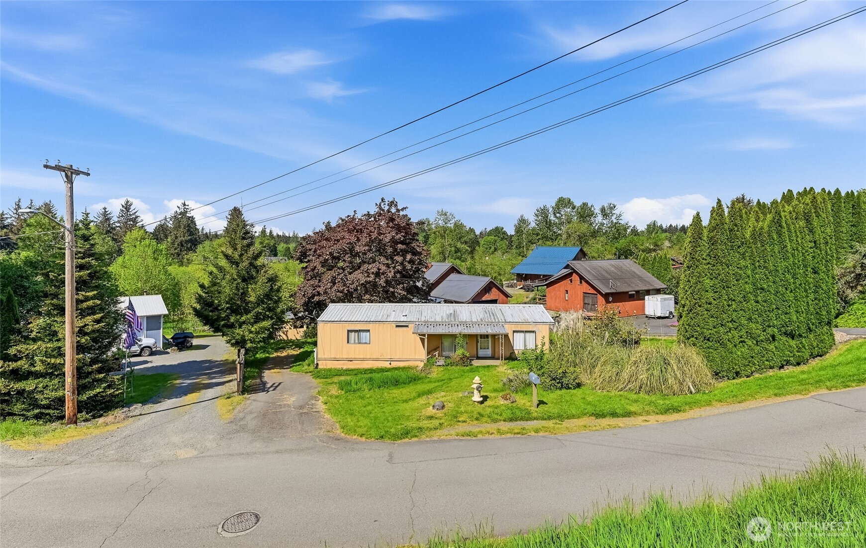 32711 Commission Avenue Black Diamond, WA 98010 - Photo 34 of 34 a front view of a house with garden