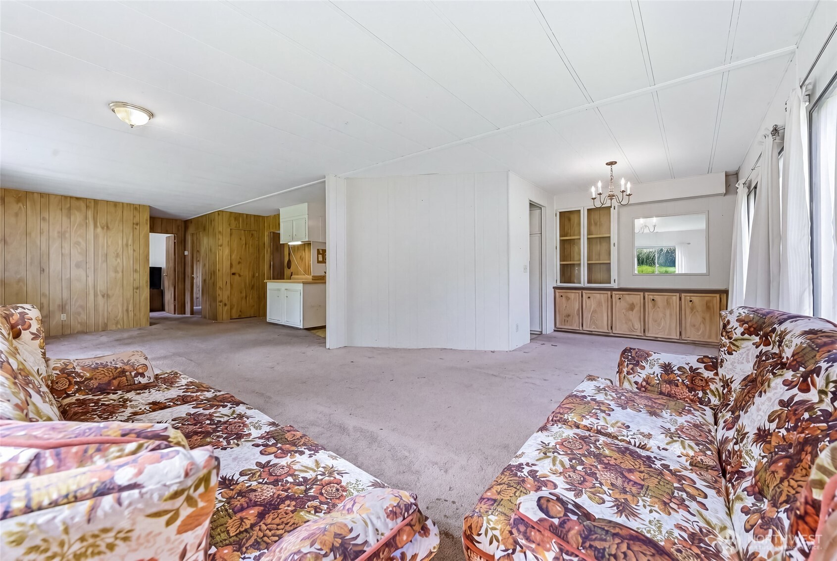 32711 Commission Avenue Black Diamond, WA 98010 - Photo 7 of 34 a bed room with a bed and a chair