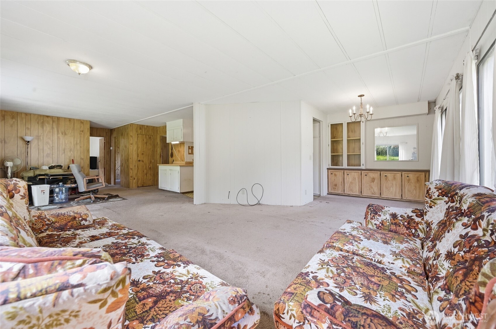 32711 Commission Avenue Black Diamond, WA 98010 - Photo 8 of 34 a bed sitting in a spacious bedroom next to a window and furniture