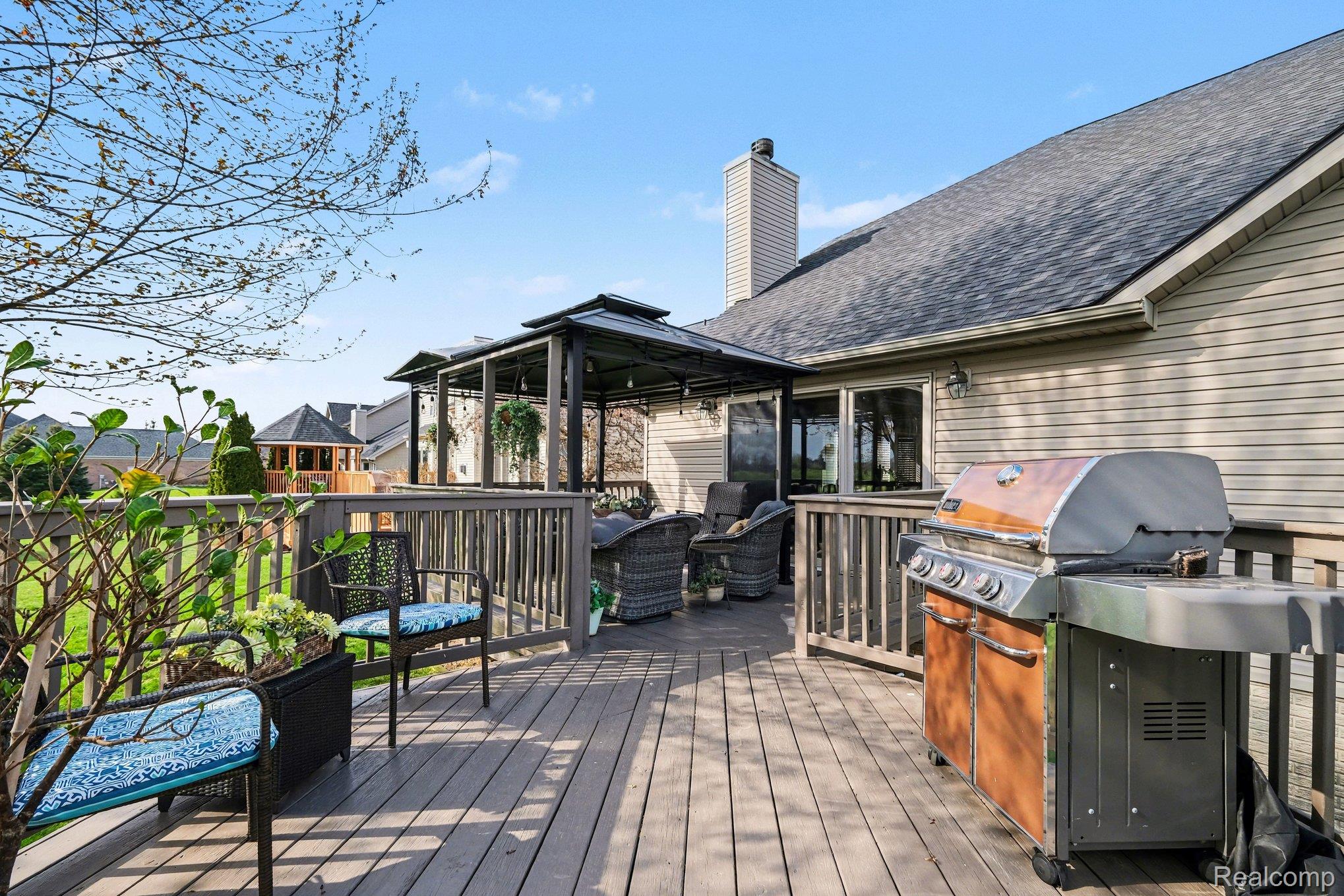 9084 Copper Ridge Drive Davison, MI 48423 - Photo 5 of 42 Wooden terrace featuring grilling area