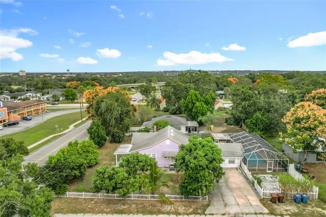 a view of a city with lots of trees