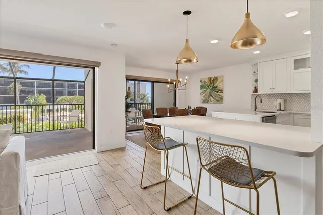 a view of dining table and chairs in a room