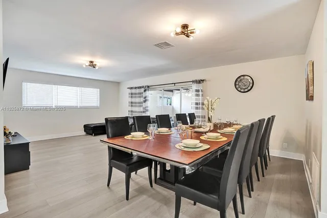 a view of a dining room with furniture