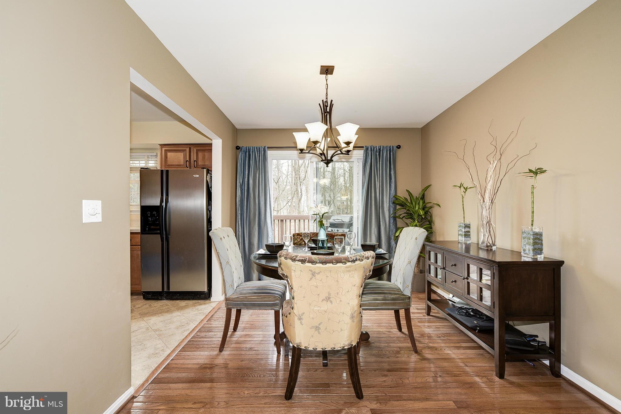 321 Lyric Lane Silver Spring, MD 20901 - Photo 5 of 30 Dining Room flows seamlessly from Living Room