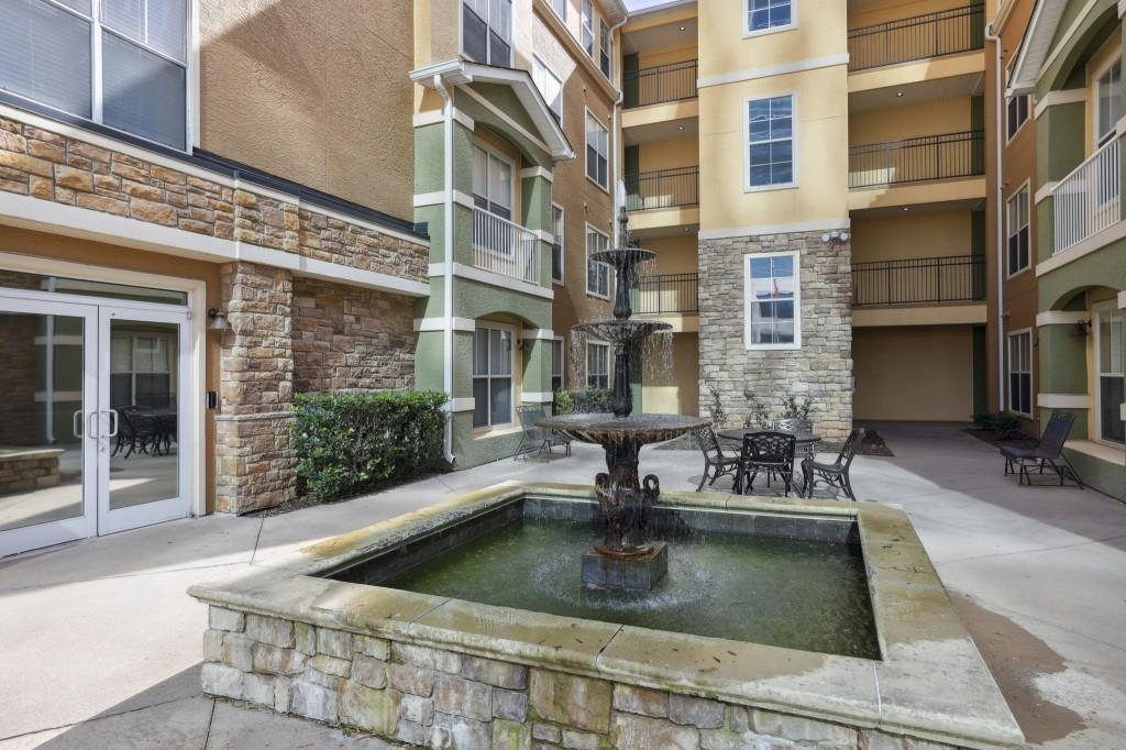 10 Perimeter Summit Boulevard, Unit 2112 Atlanta, GA 30319 - Photo 30 of 40 a view of building with outdoor seating