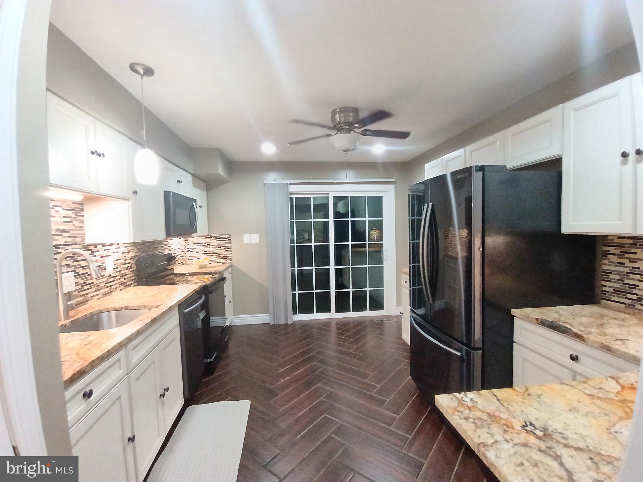 8705 Loughran Road Fort Washington, MD 20744 - Photo 7 of 25 Updated kitchen with granite counters