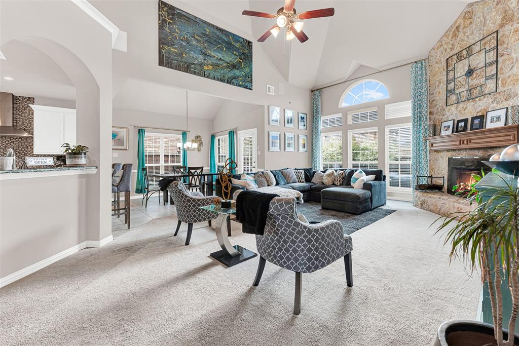 128 Chestnut Lane Red Oak, TX 75154 - Photo 14 of 28 a living room with furniture potted plant and a large window
