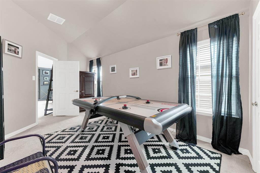 128 Chestnut Lane Red Oak, TX 75154 - Photo 25 of 28 a bed room with a bed and a window