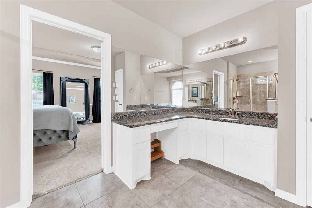 128 Chestnut Lane Red Oak, TX 75154 - Photo 6 of 28 a bathroom with a sink and a mirror
