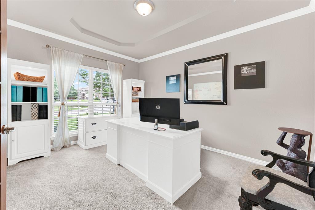 128 Chestnut Lane Red Oak, TX 75154 - Photo 7 of 28 a living room with furniture and a flat screen tv