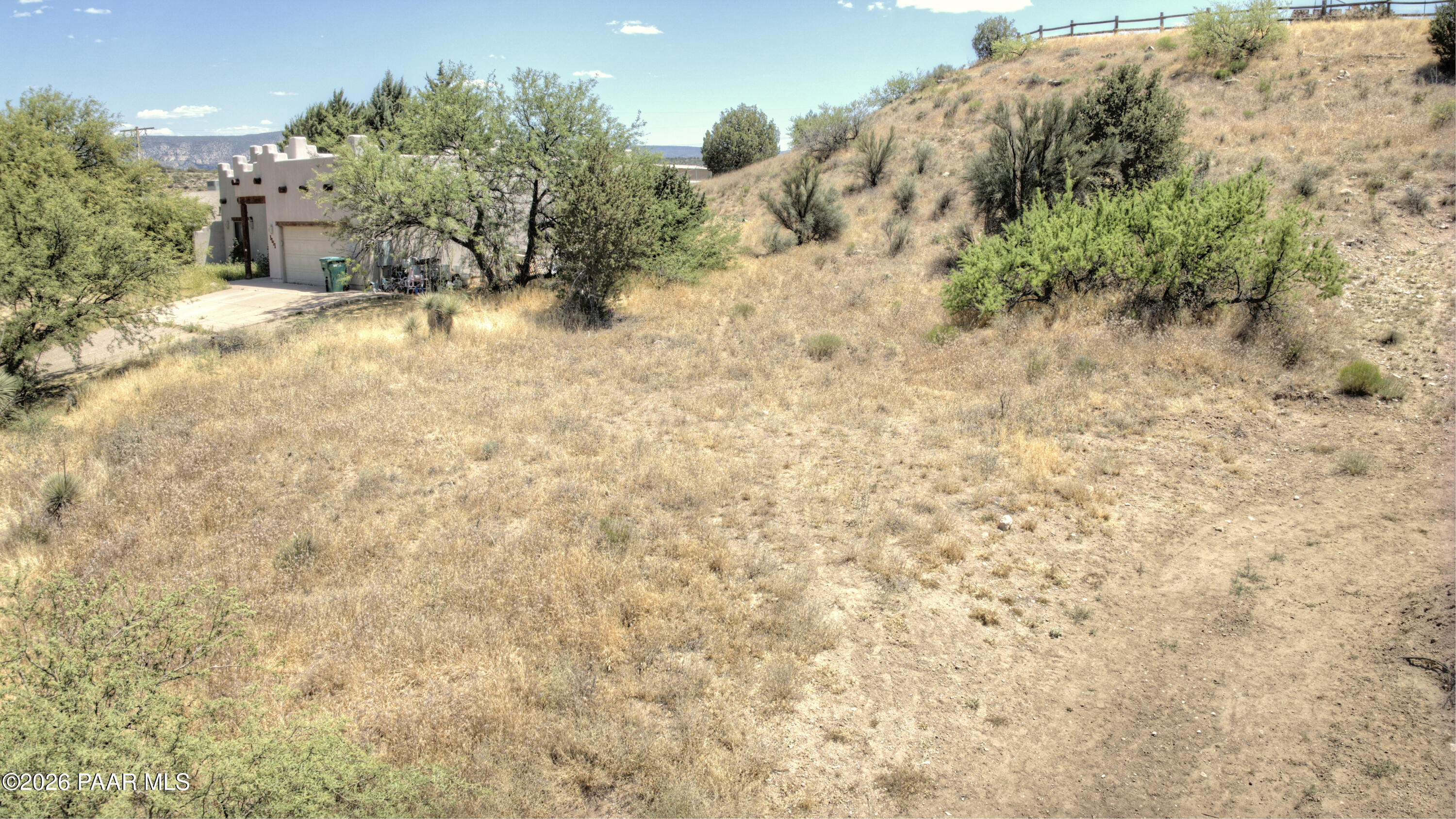 4555 East Goldmine Road Lake Montezuma, AZ 86335 - Photo 7 of 11 a view of a backyard of the house