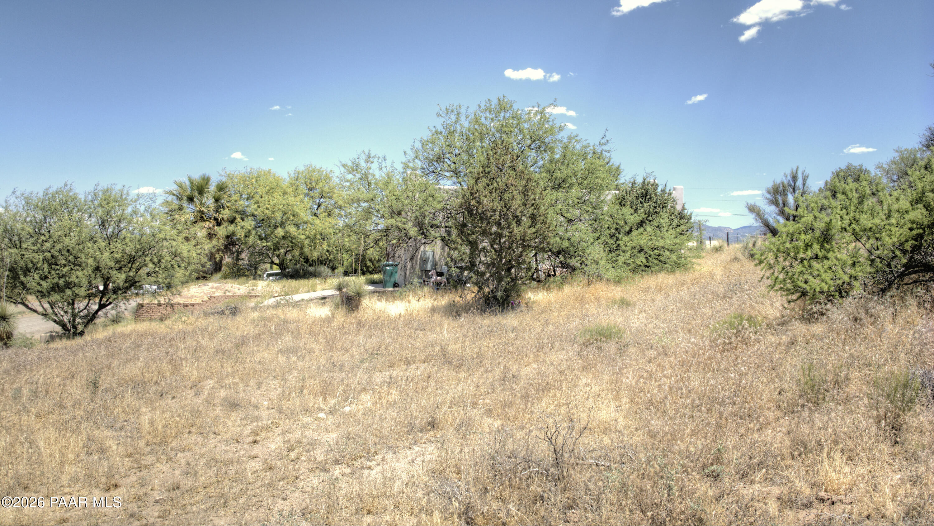 4555 East Goldmine Road Lake Montezuma, AZ 86335 - Photo 8 of 11 a view of a yard with a tree