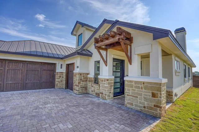front view of a house with a garage