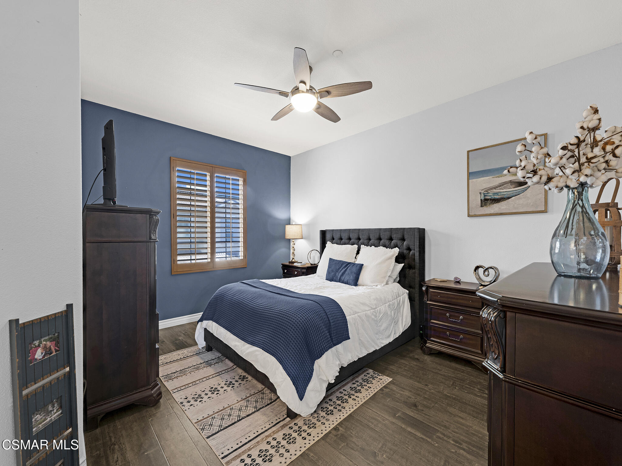 293 Springmist Lane Simi Valley, CA 93065 - Photo 25 of 50 a bedroom with a bed and a flat tv screen on dresser