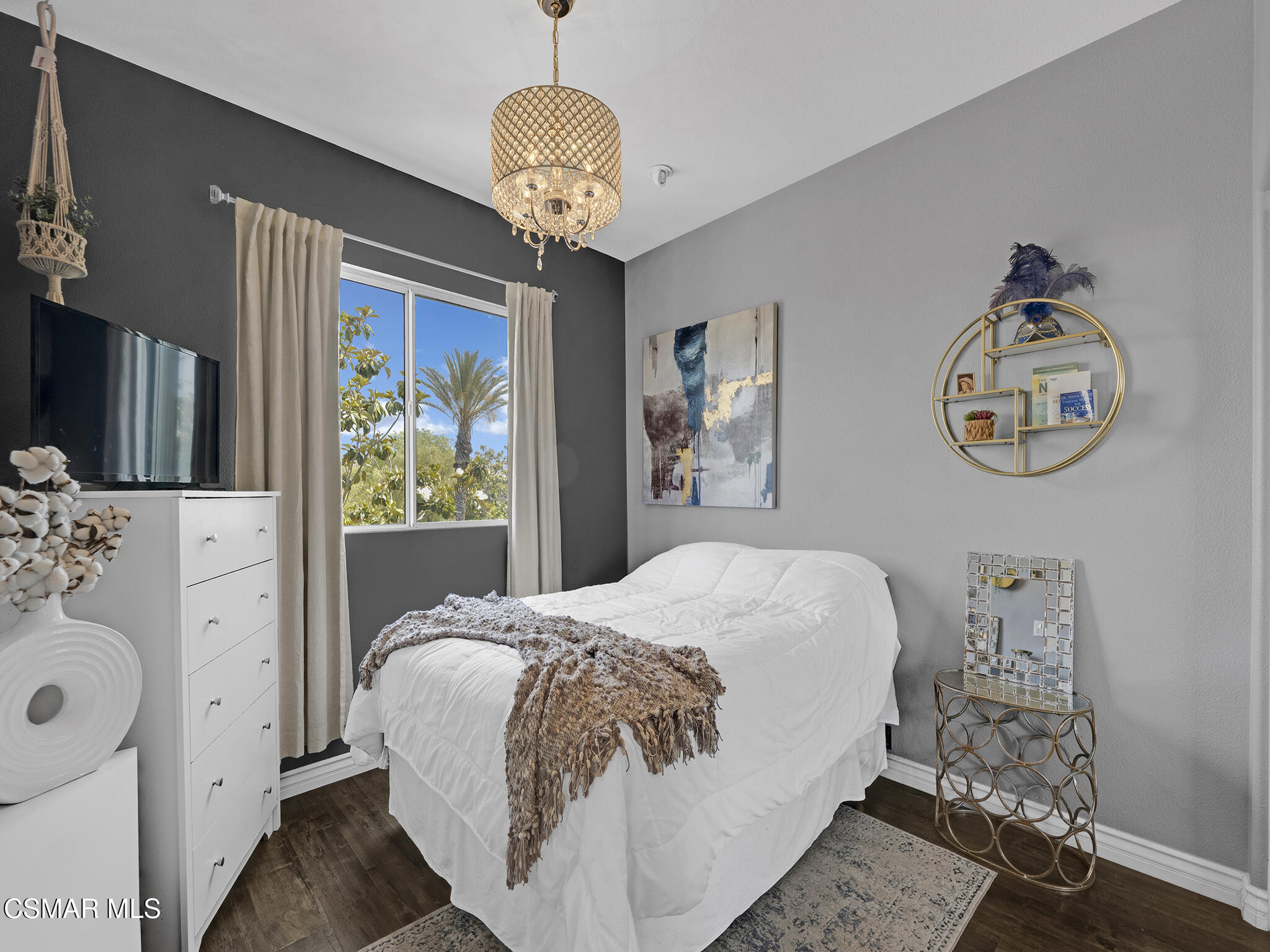 293 Springmist Lane Simi Valley, CA 93065 - Photo 28 of 50 a bedroom with a bed and dresser with wooden floor