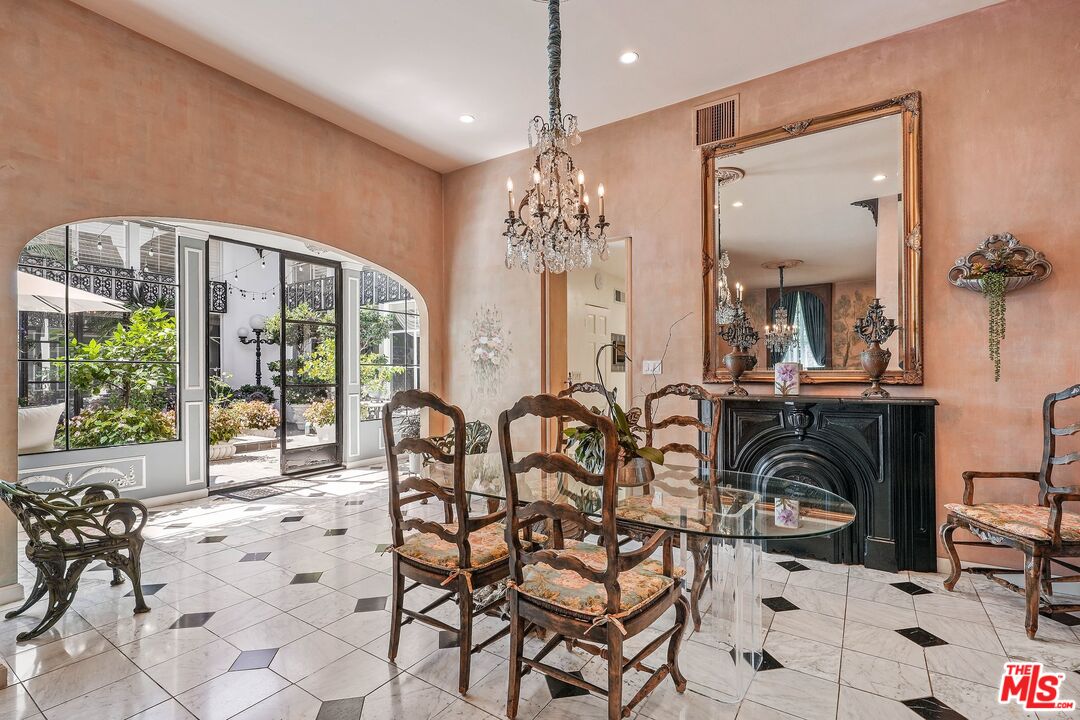 717 North Rodeo Drive Beverly Hills, CA 90210 - Photo 6 of 38 a view of a livingroom with furniture window and outside view