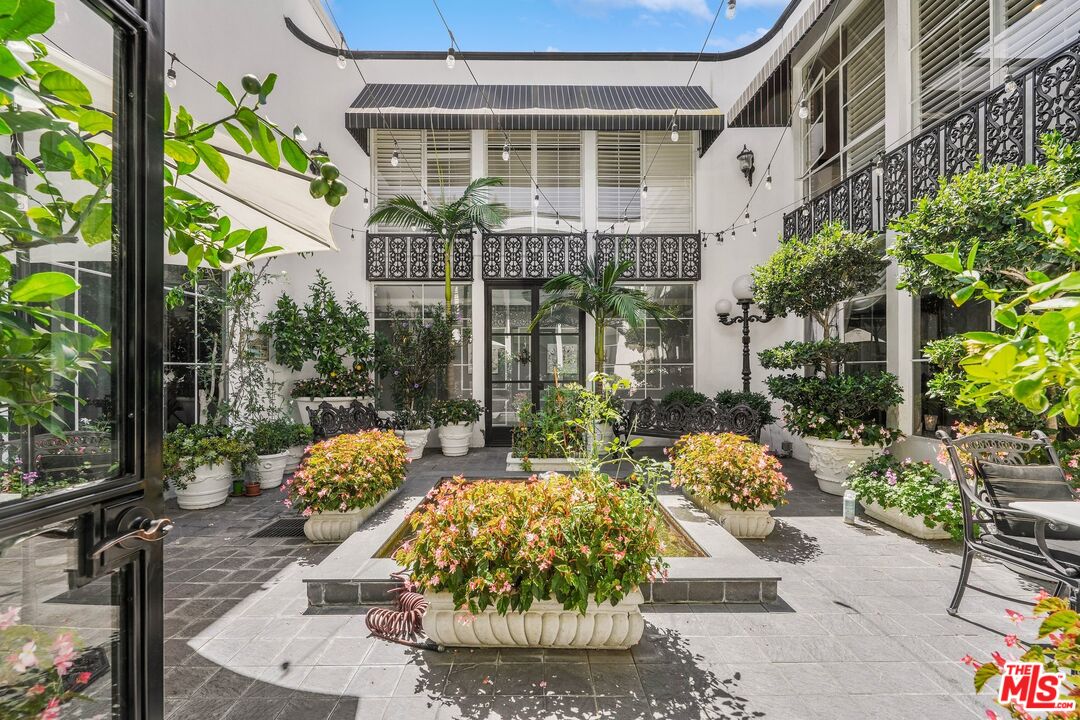 717 North Rodeo Drive Beverly Hills, CA 90210 - Photo 7 of 38 a view of a building with garden and sitting area