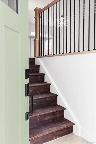 a view of entryway with wooden floor