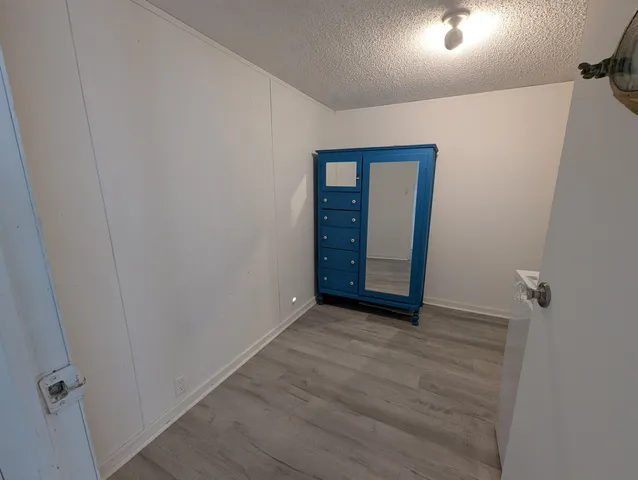 an empty room with closet