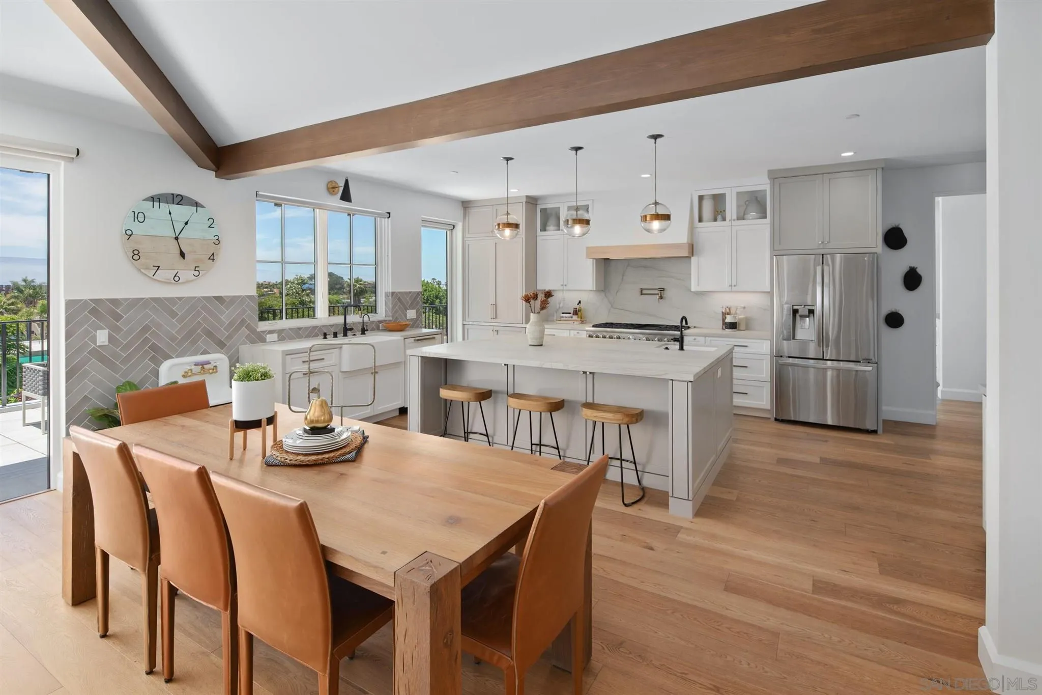 425 South Rios Avenue Solana Beach, CA 92075 - Photo 12 of 50 a view of a dining room with furniture and wooden floor