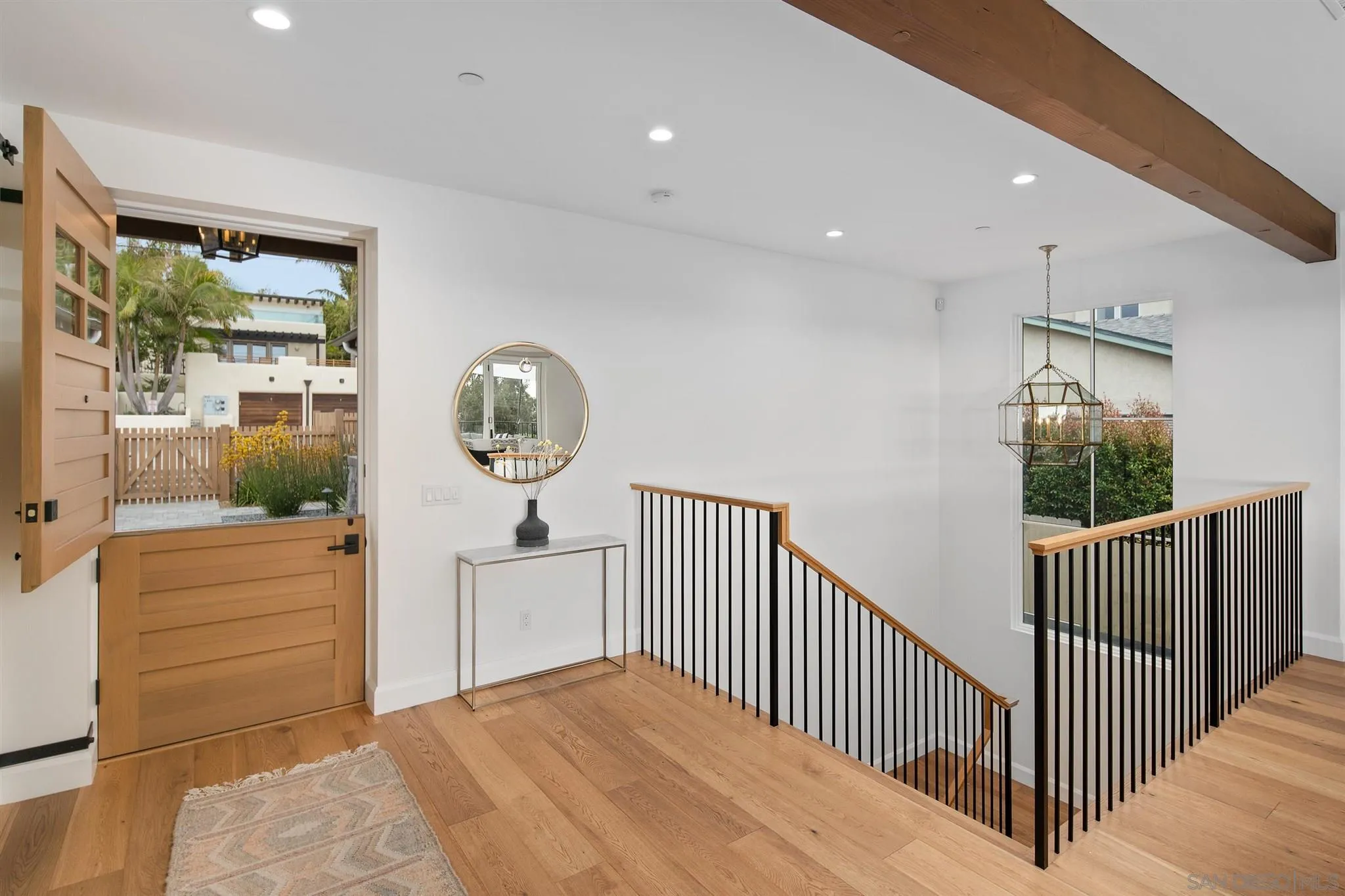 425 South Rios Avenue Solana Beach, CA 92075 - Photo 16 of 50 a view of a hallway with window