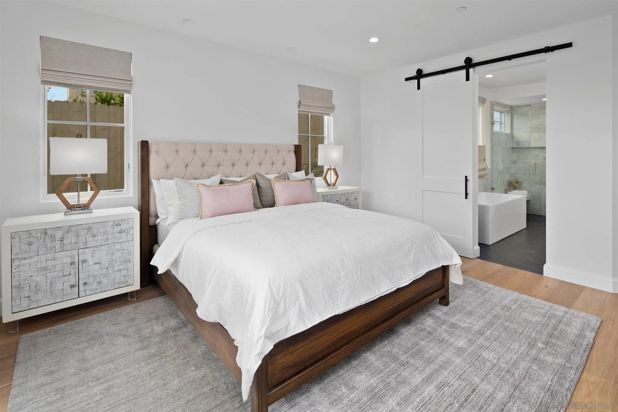 425 South Rios Avenue Solana Beach, CA 92075 - Photo 19 of 50 a bedroom with bed and window