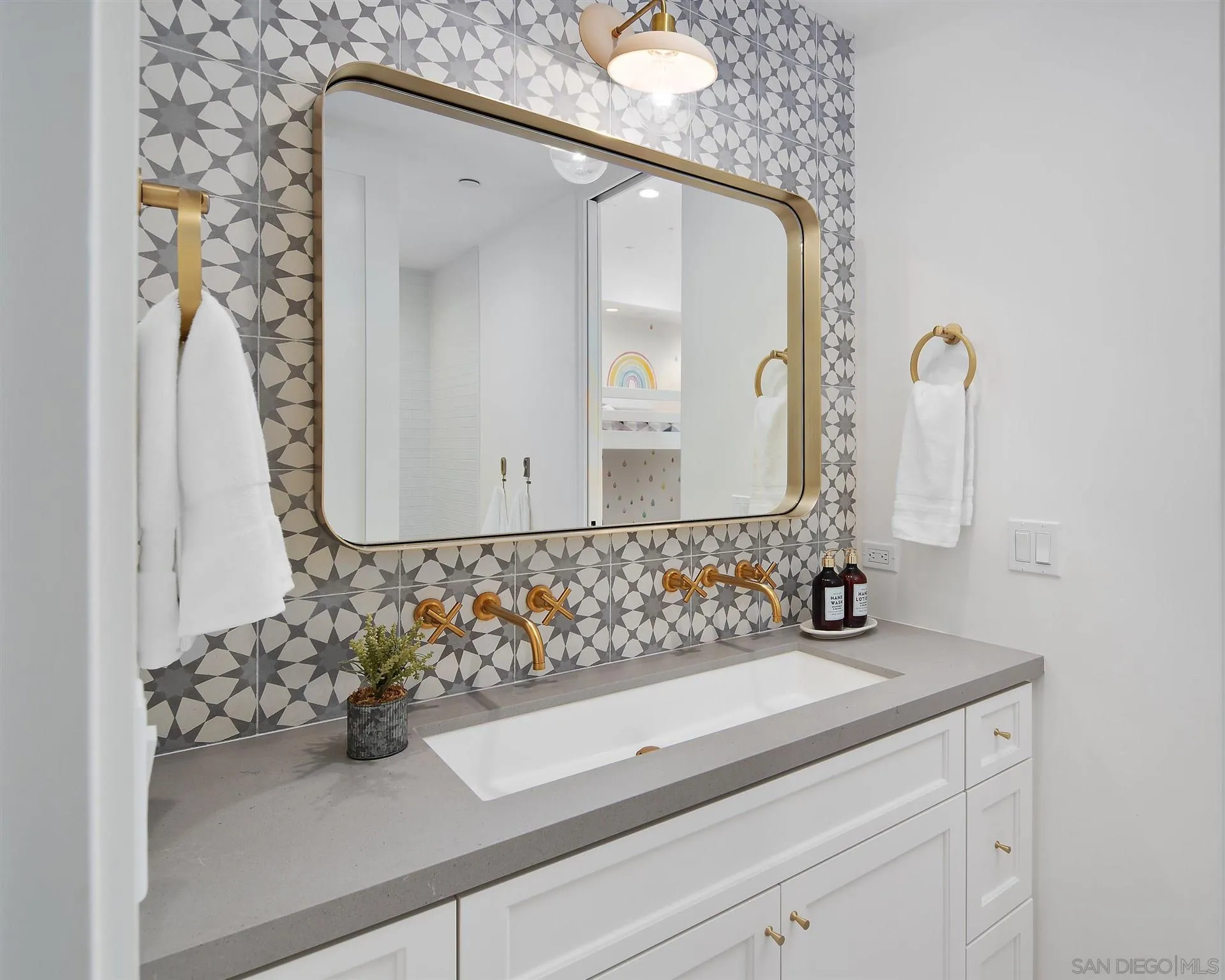 425 South Rios Avenue Solana Beach, CA 92075 - Photo 28 of 50 a bathroom with a sink and a mirror