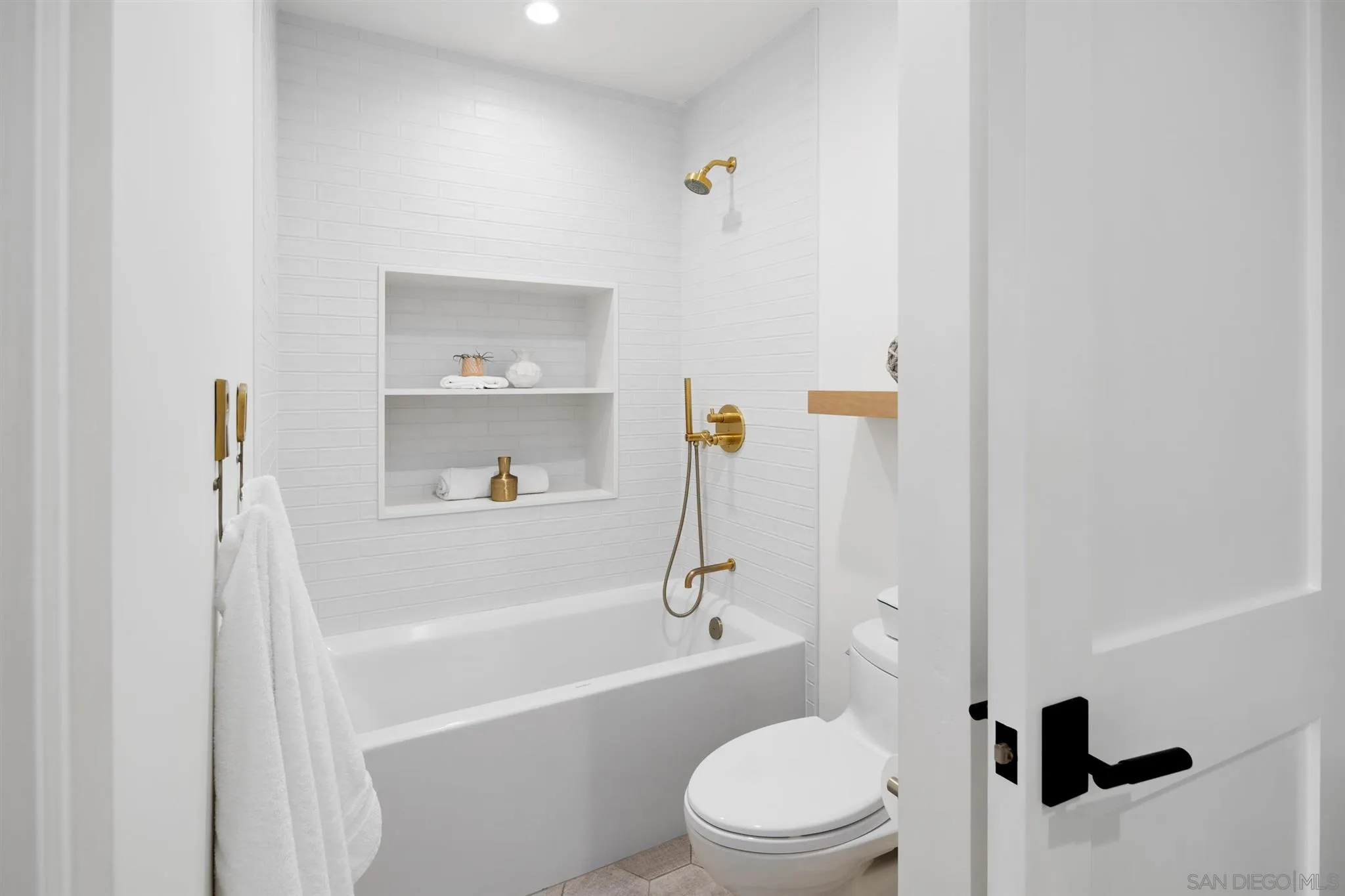 425 South Rios Avenue Solana Beach, CA 92075 - Photo 29 of 50 a bathroom with a bathtub a toilet and a shower