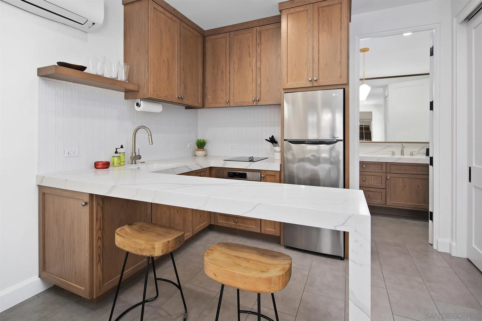 425 South Rios Avenue Solana Beach, CA 92075 - Photo 34 of 50 a kitchen with a sink cabinets and window