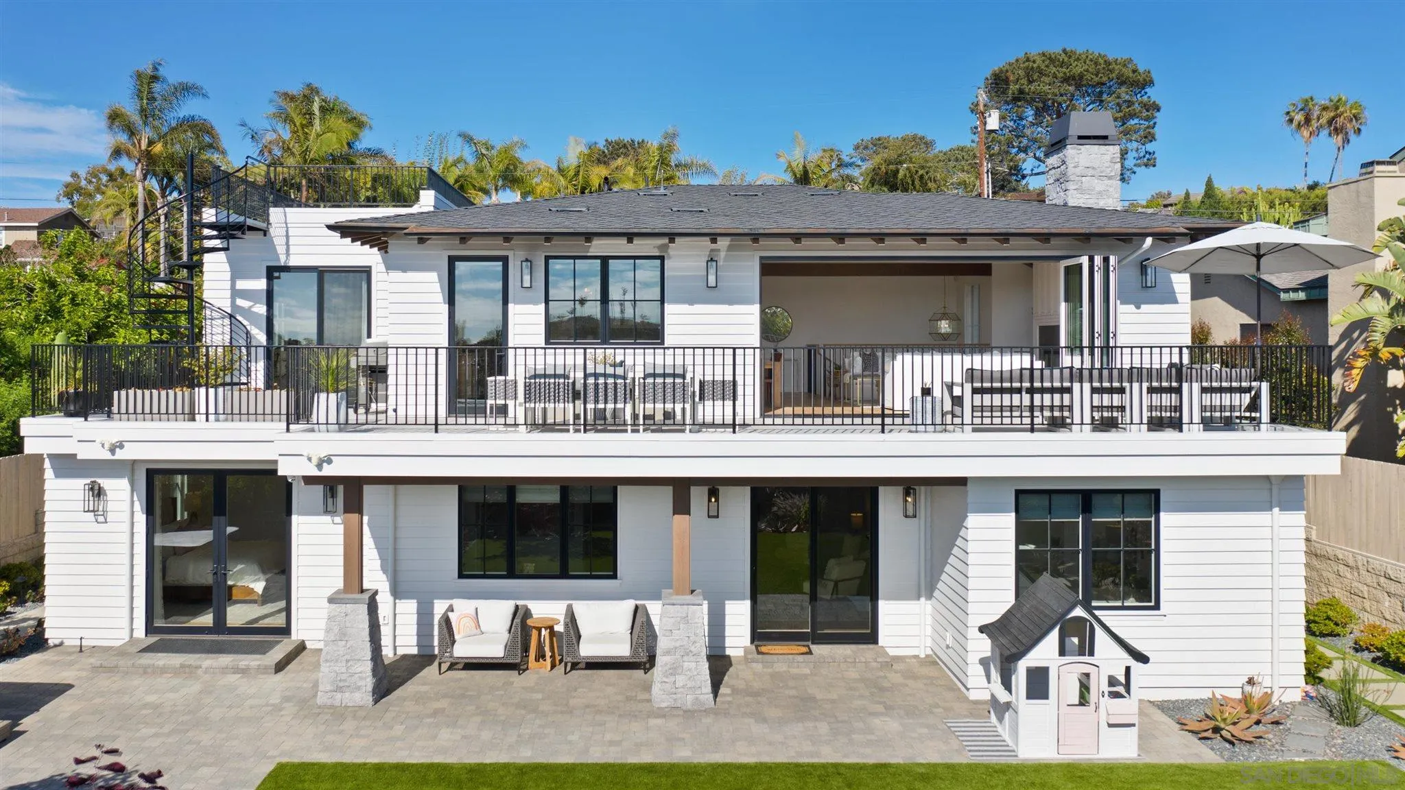 425 South Rios Avenue Solana Beach, CA 92075 - Photo 40 of 50 a front view of a building with garden