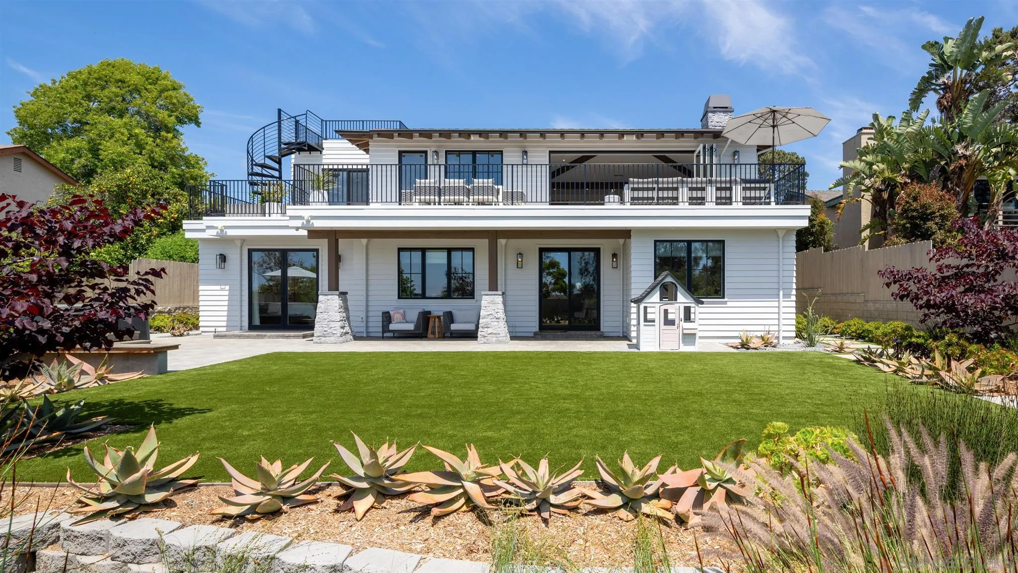 425 South Rios Avenue Solana Beach, CA 92075 - Photo 41 of 50 a view of a building with a garden