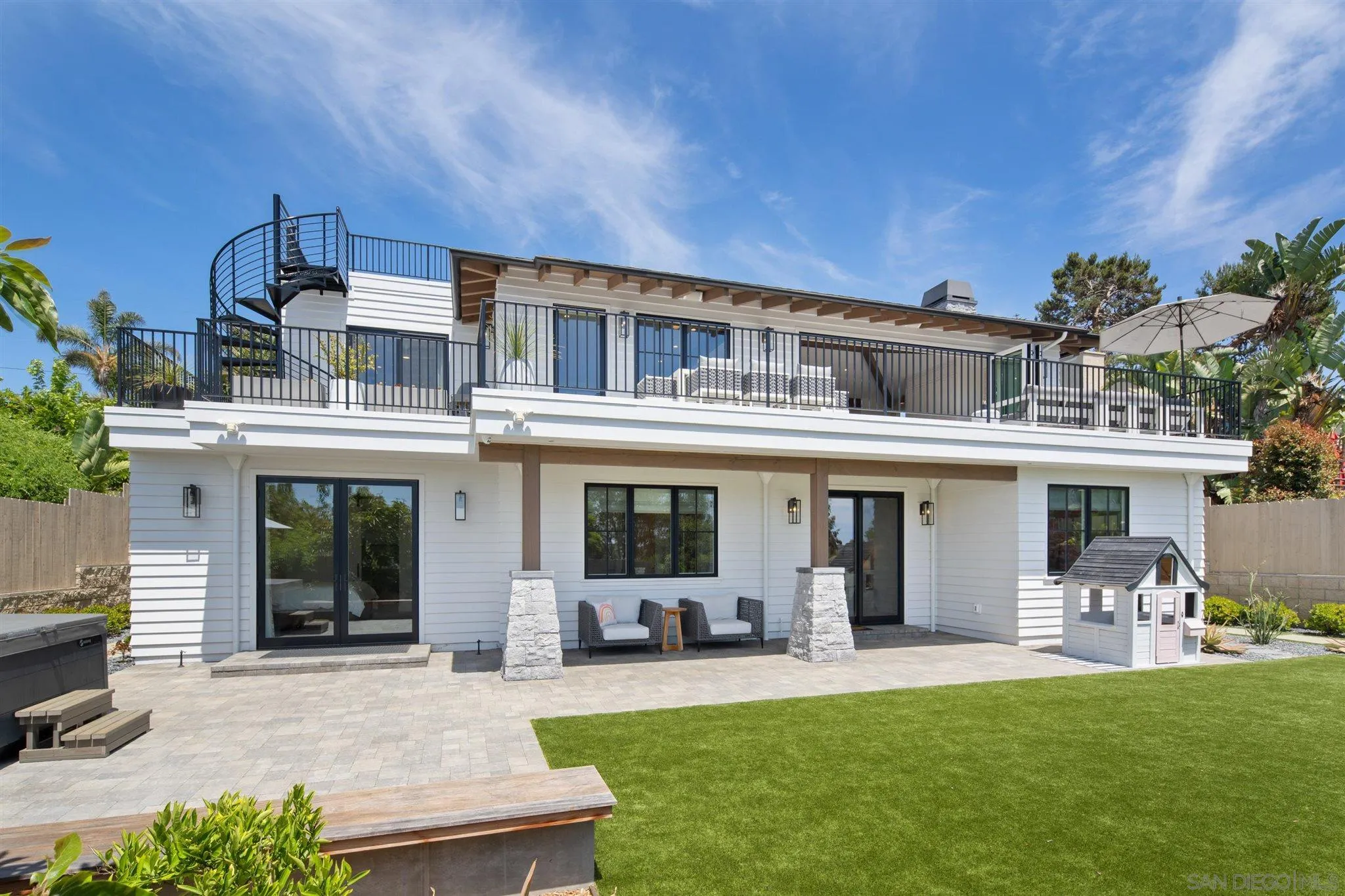 425 South Rios Avenue Solana Beach, CA 92075 - Photo 42 of 50 a front view of a house with a garden and plants