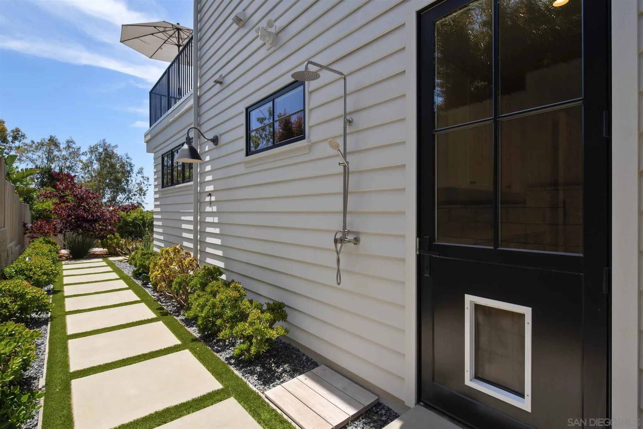 425 South Rios Avenue Solana Beach, CA 92075 - Photo 46 of 50 a view of a house with a door and a potted plant