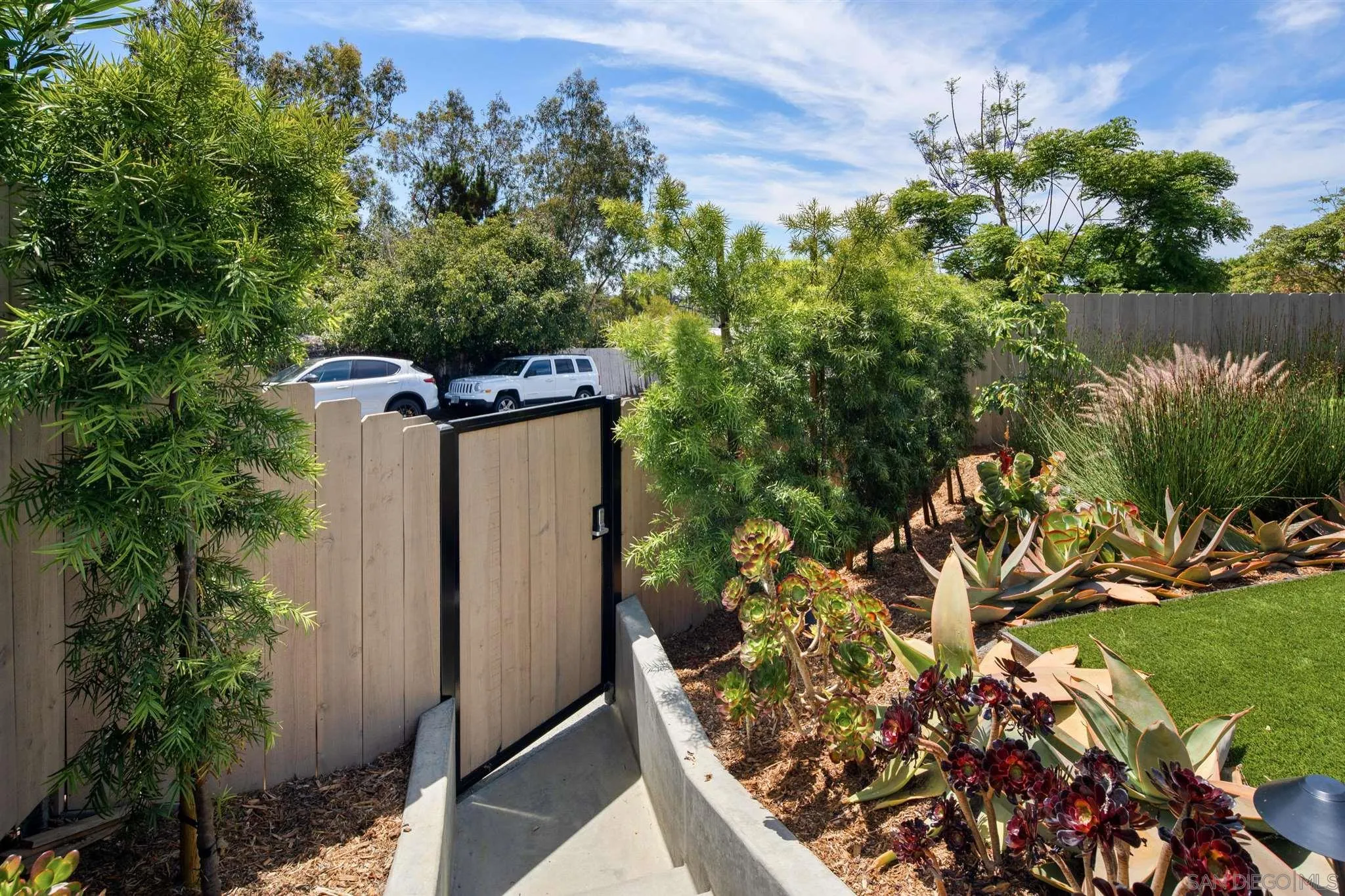 425 South Rios Avenue Solana Beach, CA 92075 - Photo 47 of 50 a view of a house with a yard and potted plants