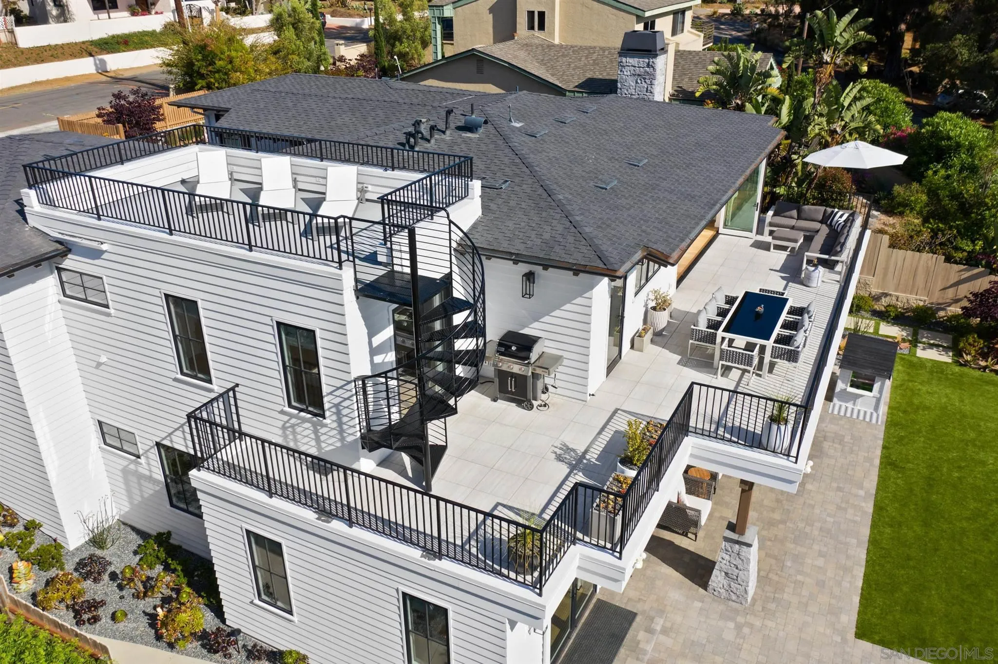 425 South Rios Avenue Solana Beach, CA 92075 - Photo 48 of 50 a view of a patio with table and chairs and potted plants