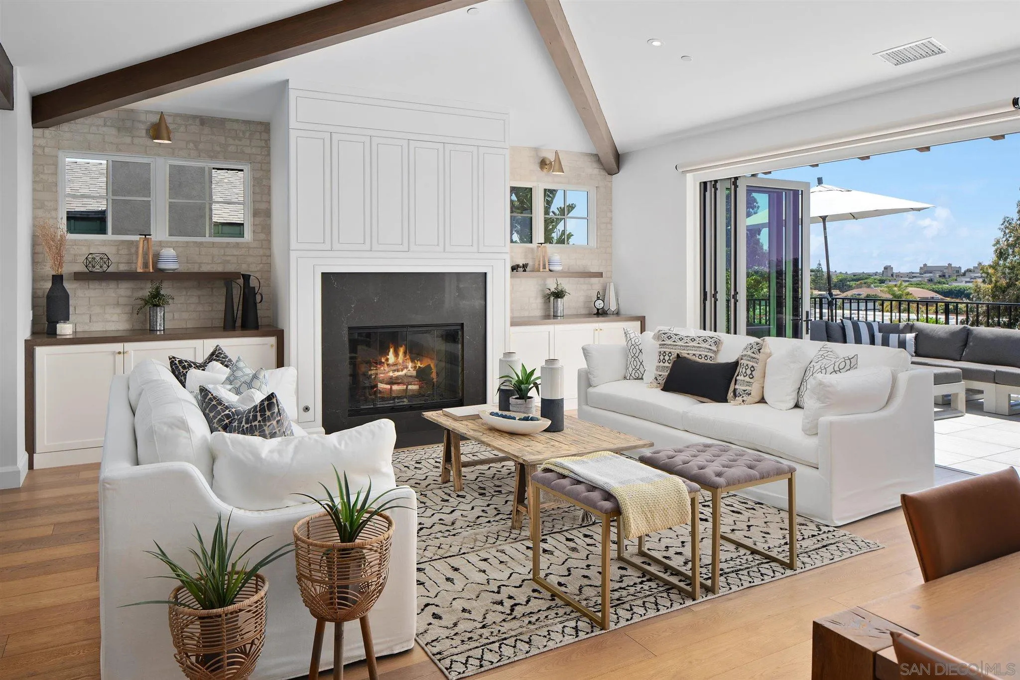 425 South Rios Avenue Solana Beach, CA 92075 - Photo 6 of 50 a living room with furniture and a fireplace
