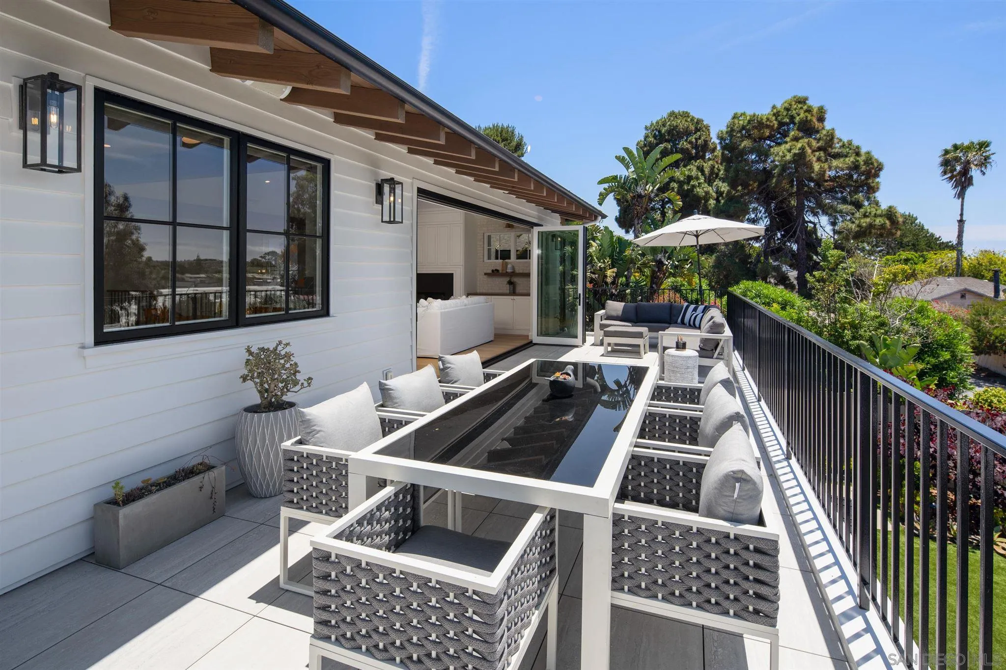 425 South Rios Avenue Solana Beach, CA 92075 - Photo 8 of 50 a view of outdoor sitting area with furniture and wooden floor