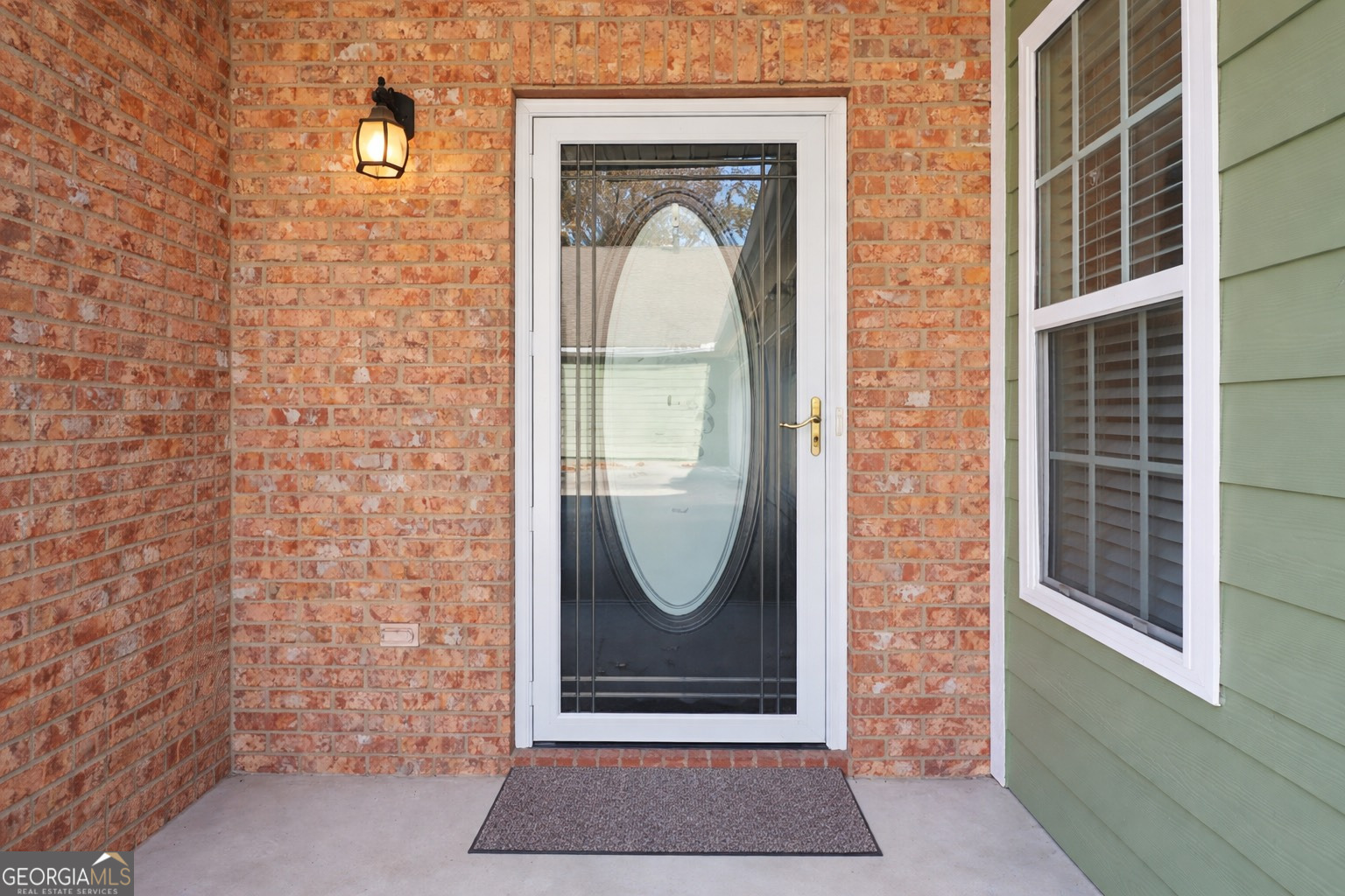 1502 Commonwealth Circle Newnan, GA 30263 - Photo 5 of 30 a front view of a house with a door