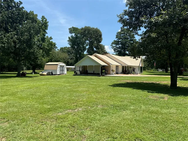 a house view with garden space