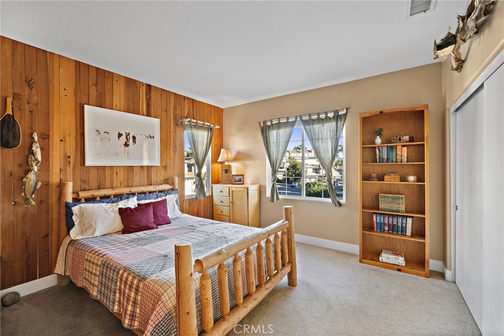 19361 Jasper Hill Road Lake Forest, CA 92679 - Photo 13 of 37 a bedroom with a bed and a large window