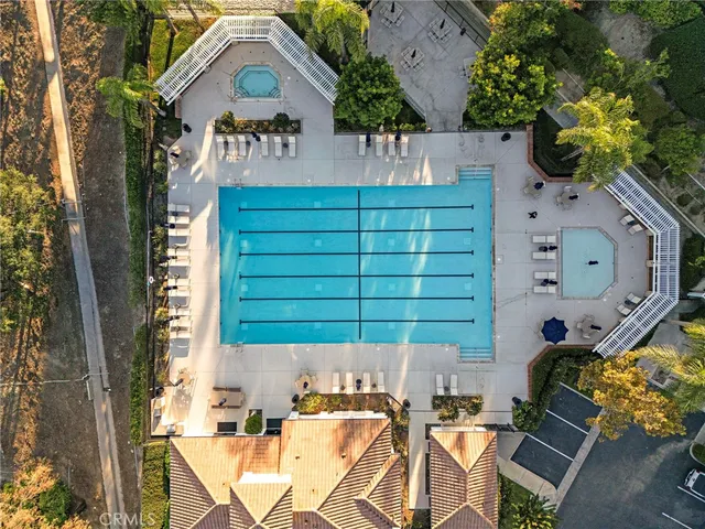 aerial view of a house with a yard