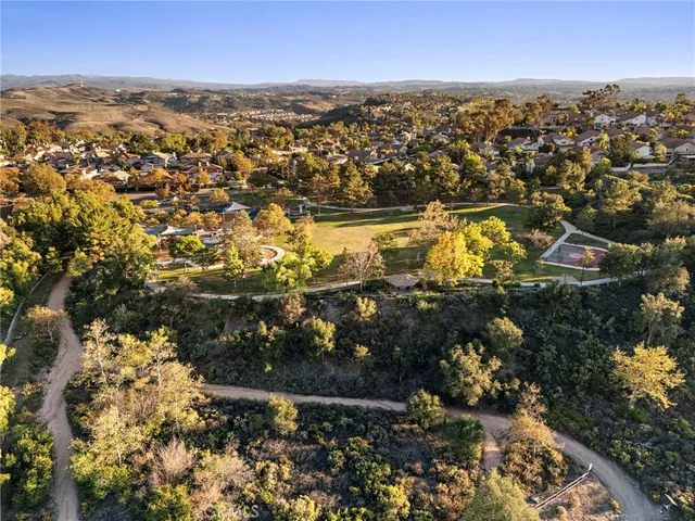 an aerial view of residential house with parking space