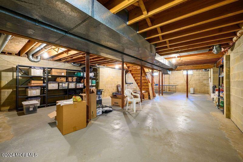 14 Spicy Pond Road Howell, NJ 07731 - Photo 32 of 35 a view of a storage room with windows