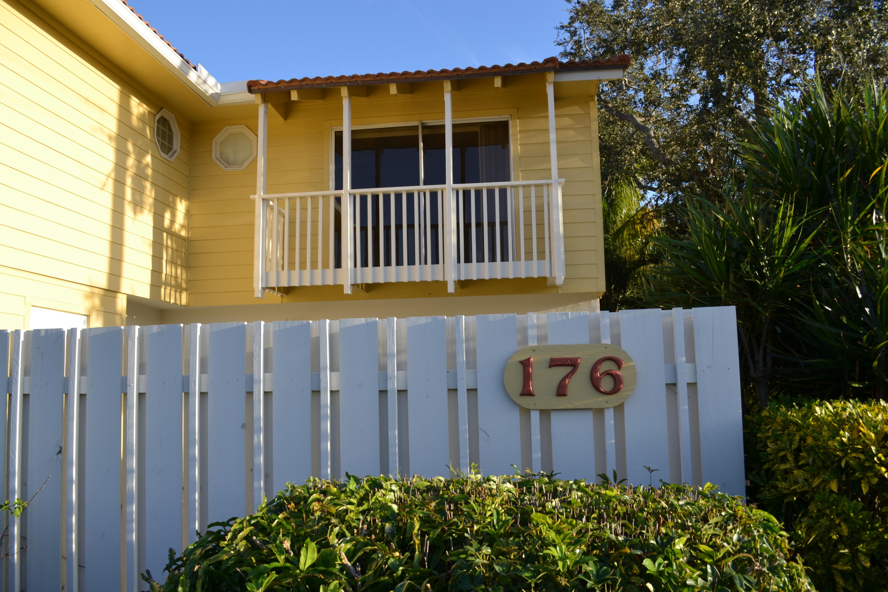 176 Seabreeze Circle Jupiter, FL 33477 - Photo 1 of 28 a sign that is on the wooden wall