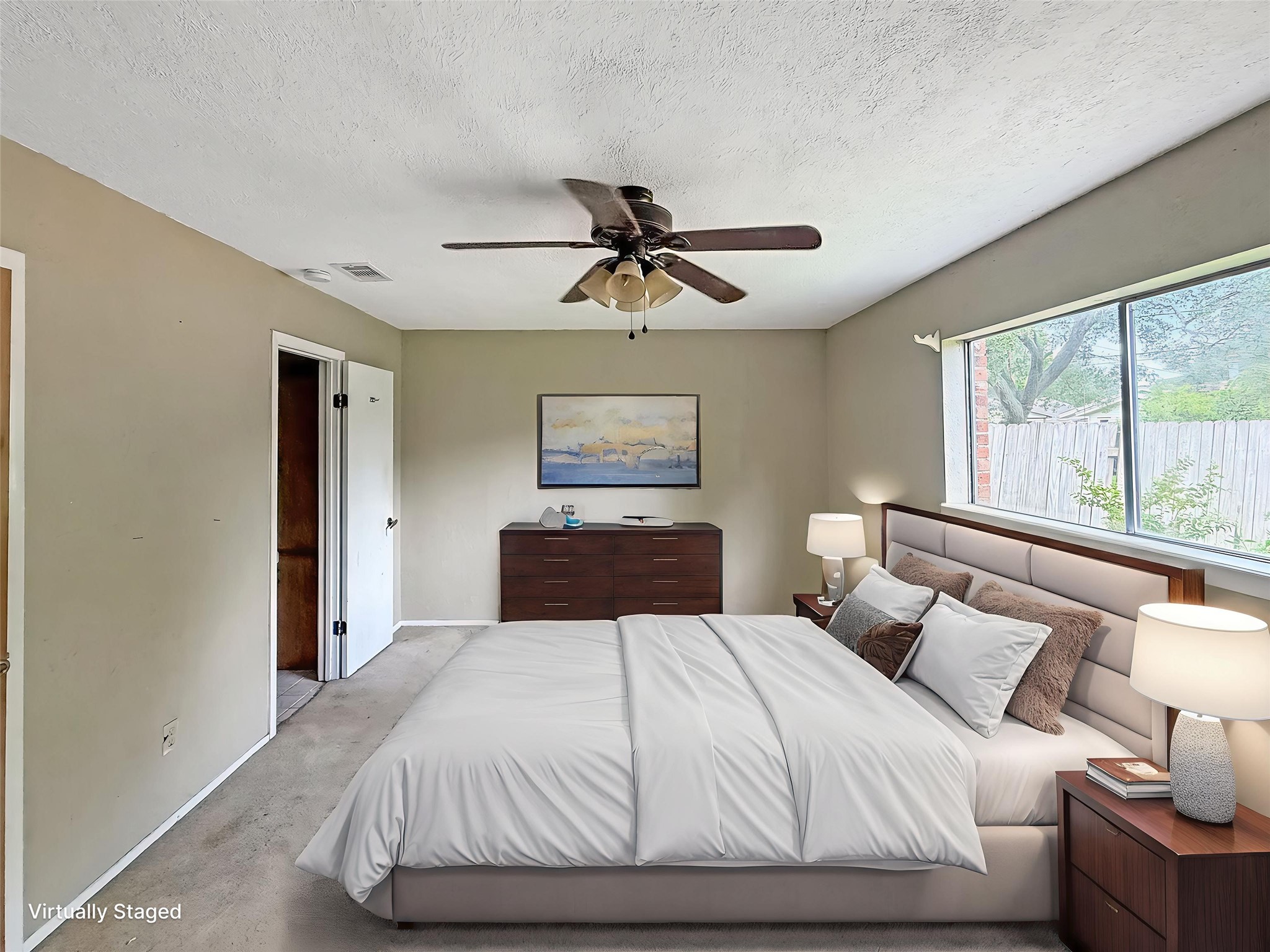 1413 Bay Ridge Boulevard Bay City, TX 77414 - Photo 3 of 20 a bedroom with a bed and window