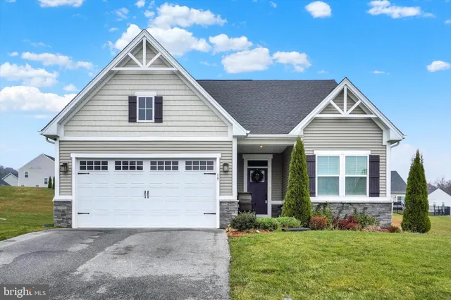 a picture of a bathroom with a refrigerator