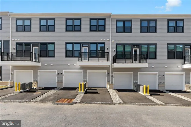 a white building with a outdoor space